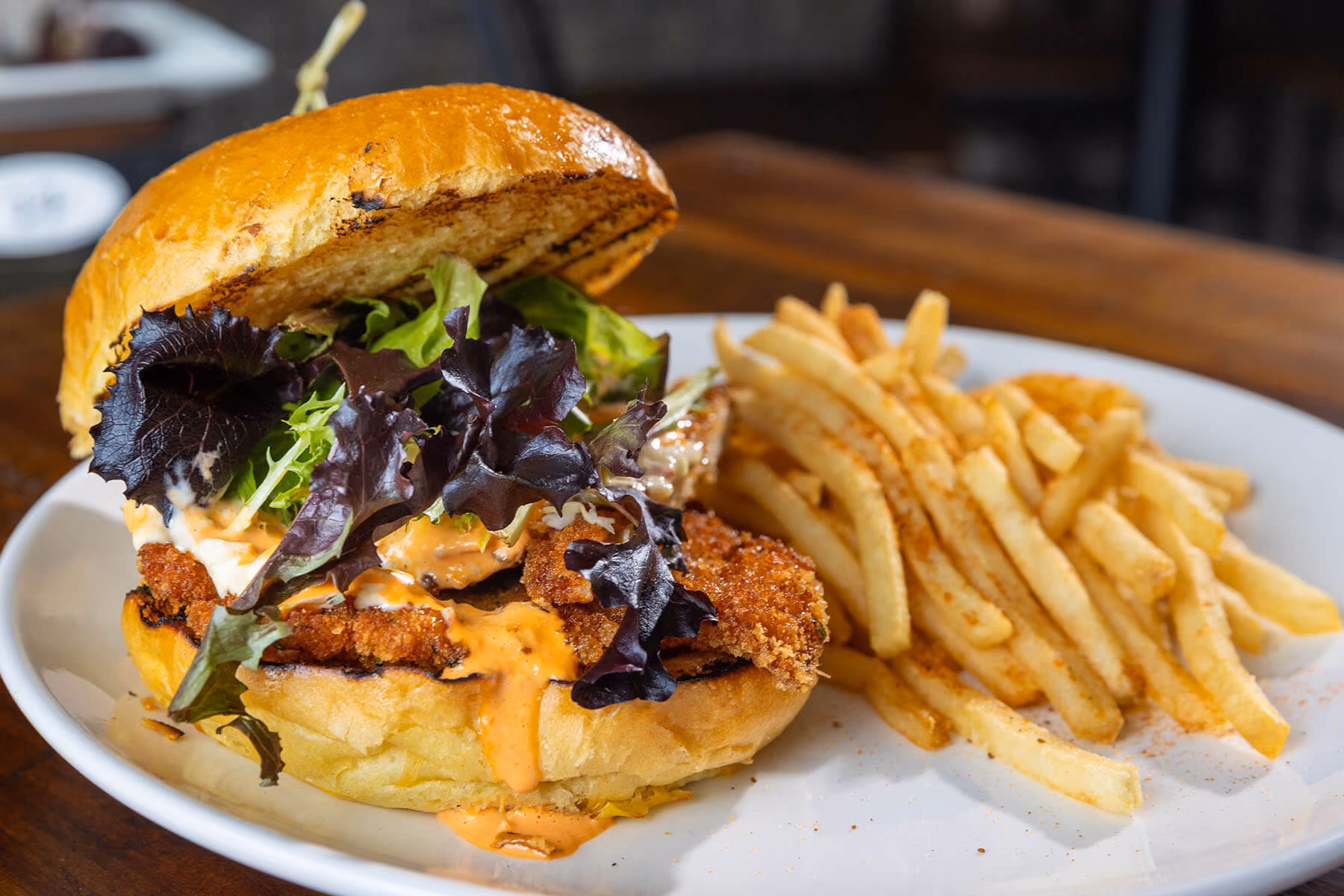 Crab cake sandwich with fries