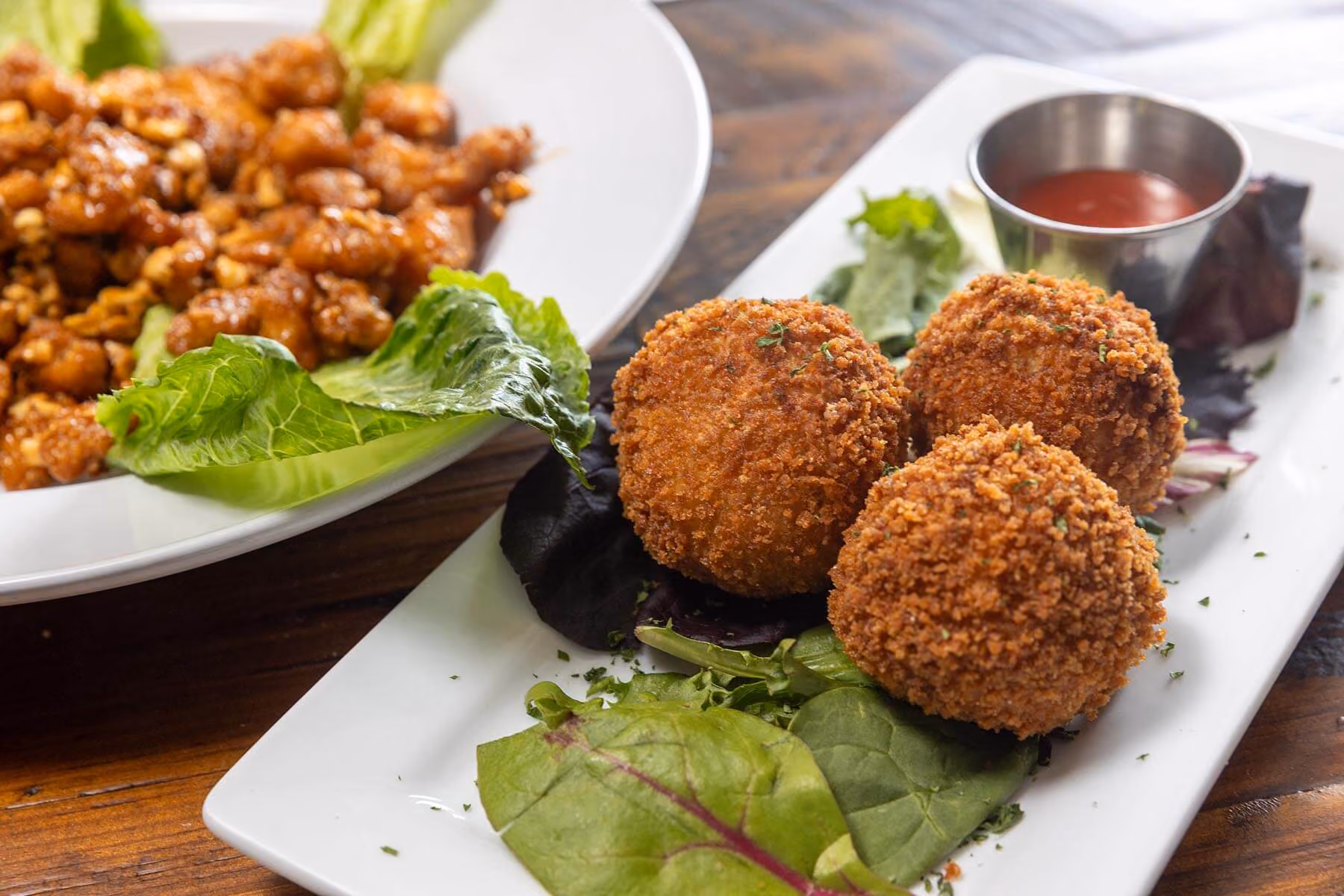 Crispy arancini balls served with marinara